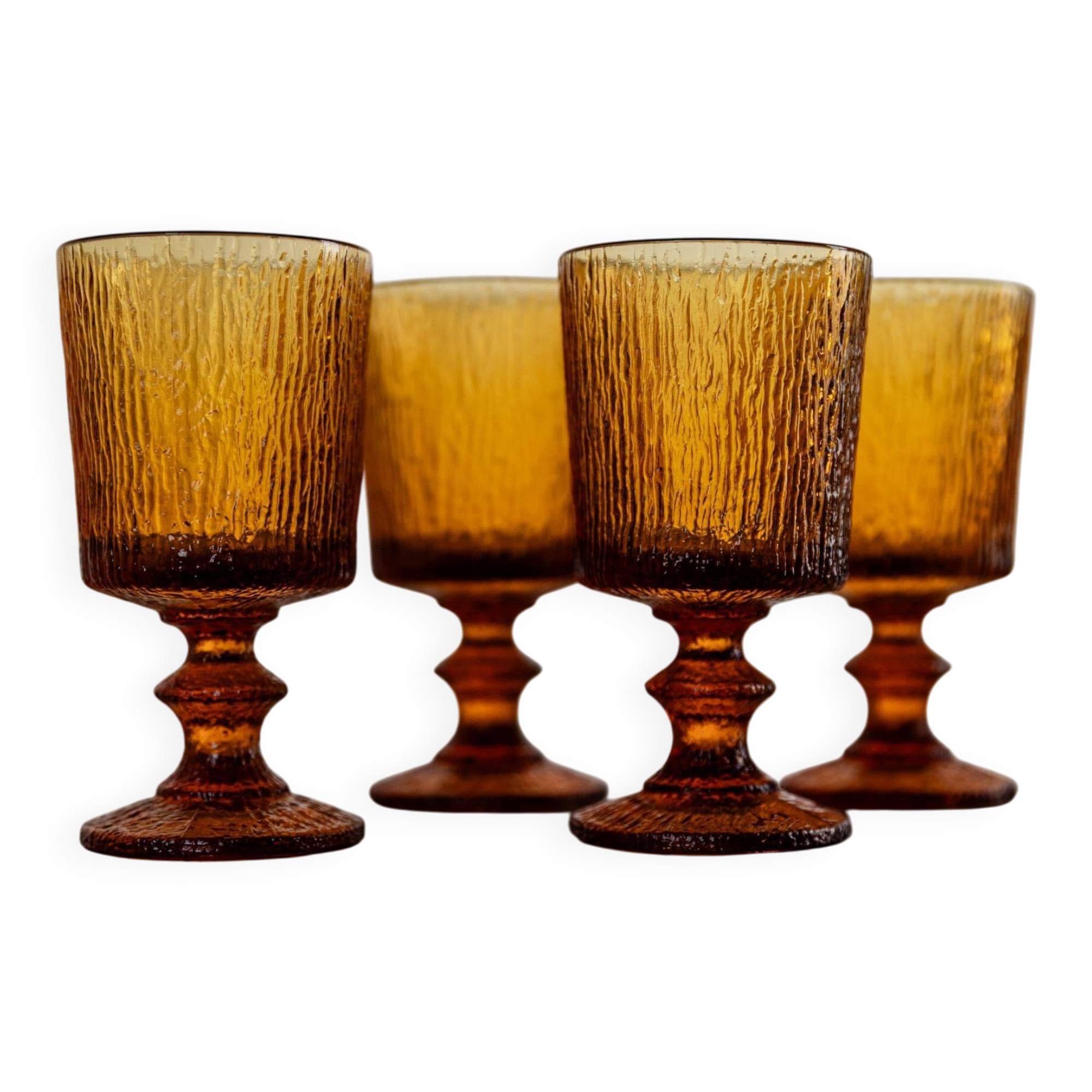 Lot of 4 vintage wine glasses from the 1970s, textured amber on a stem, design by Timo Sarpaneva for Iittala.