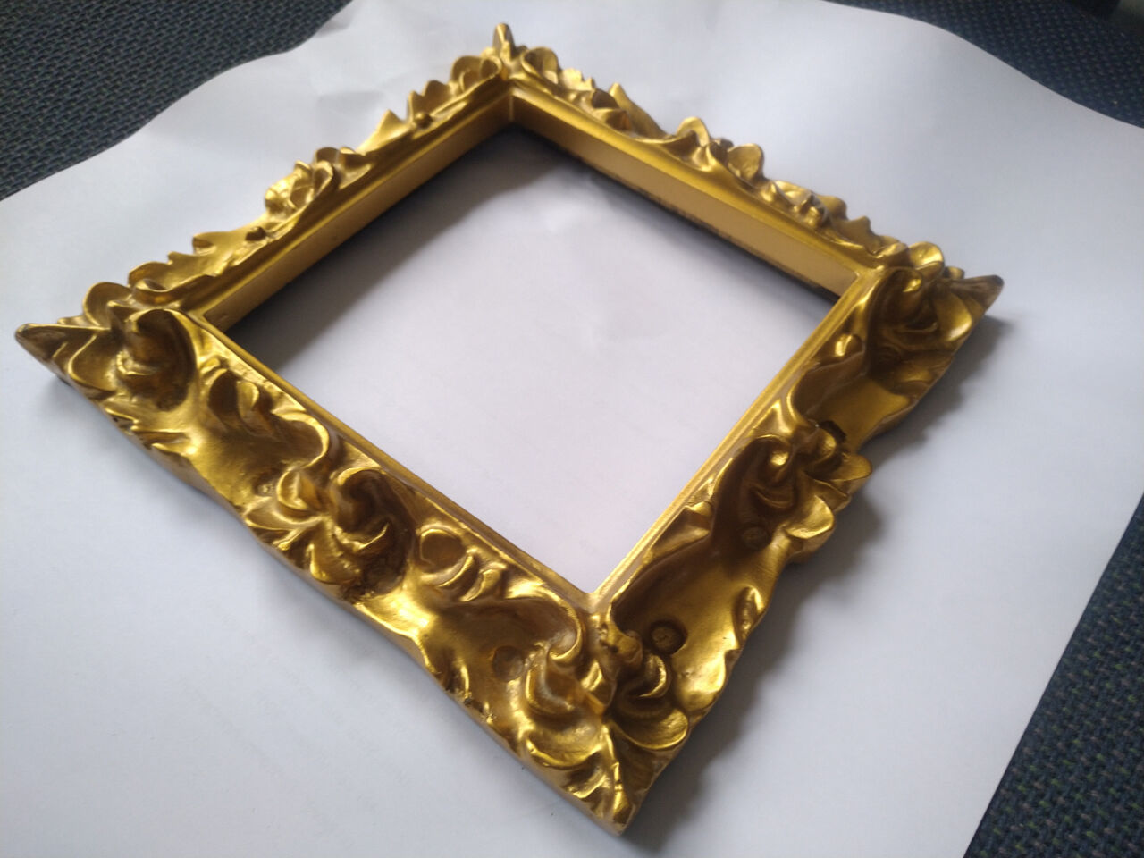 Sculpted square golden frame