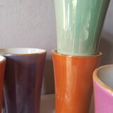 8 coloured cups in earthenware