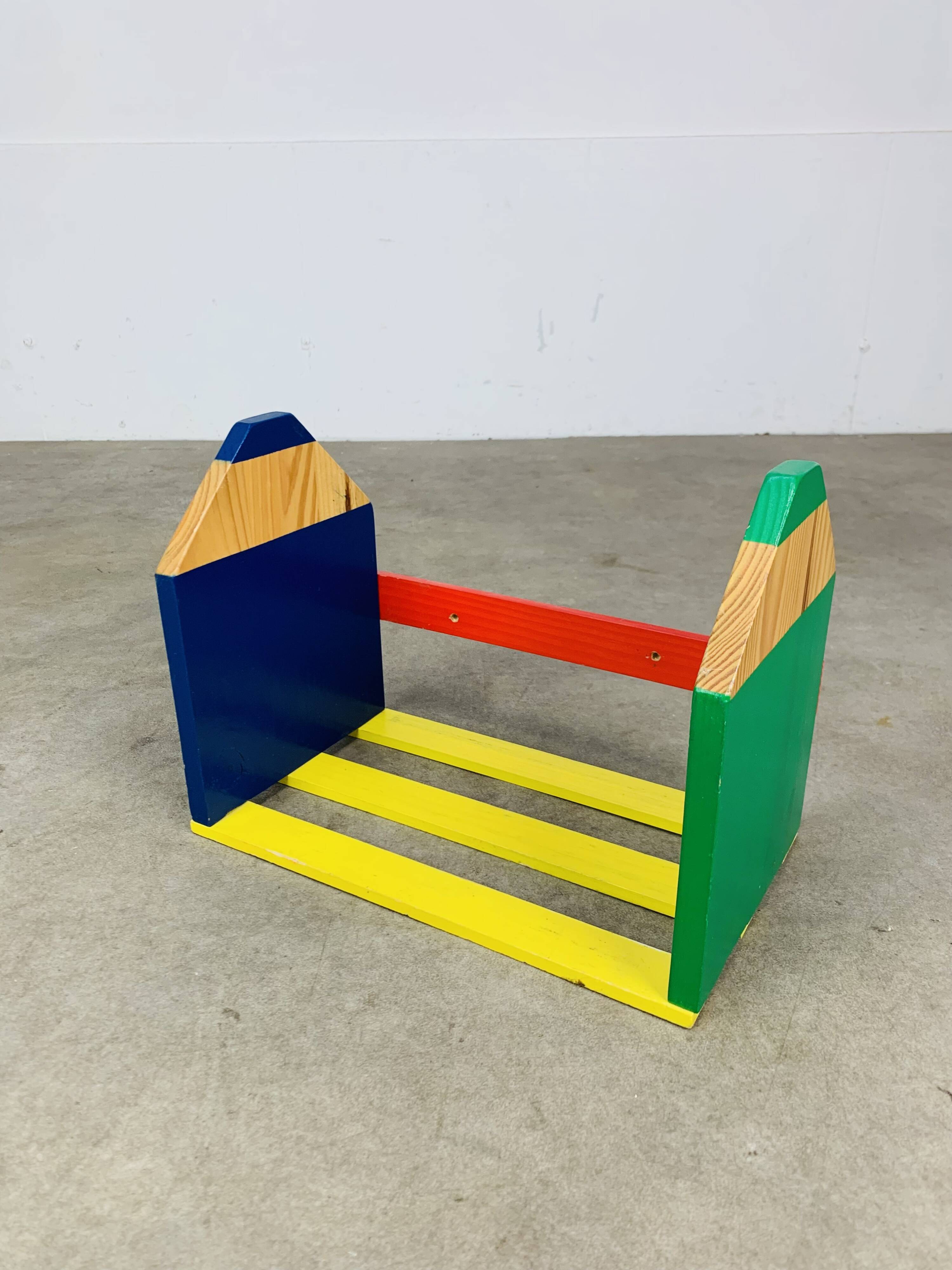 Wall-mounted pencil shelf for children, Pierre Sala style.