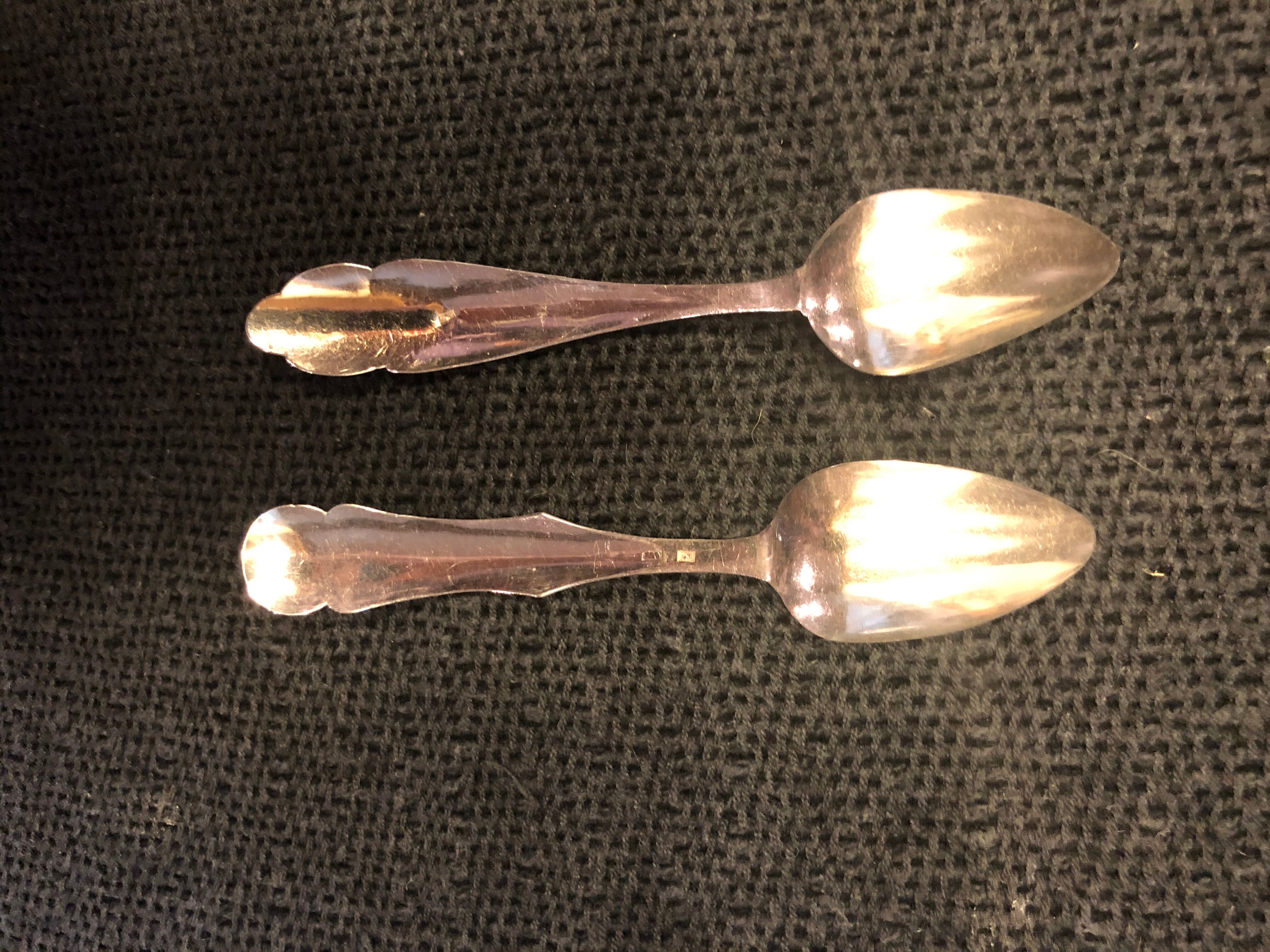 2 teaspoons in solid silver