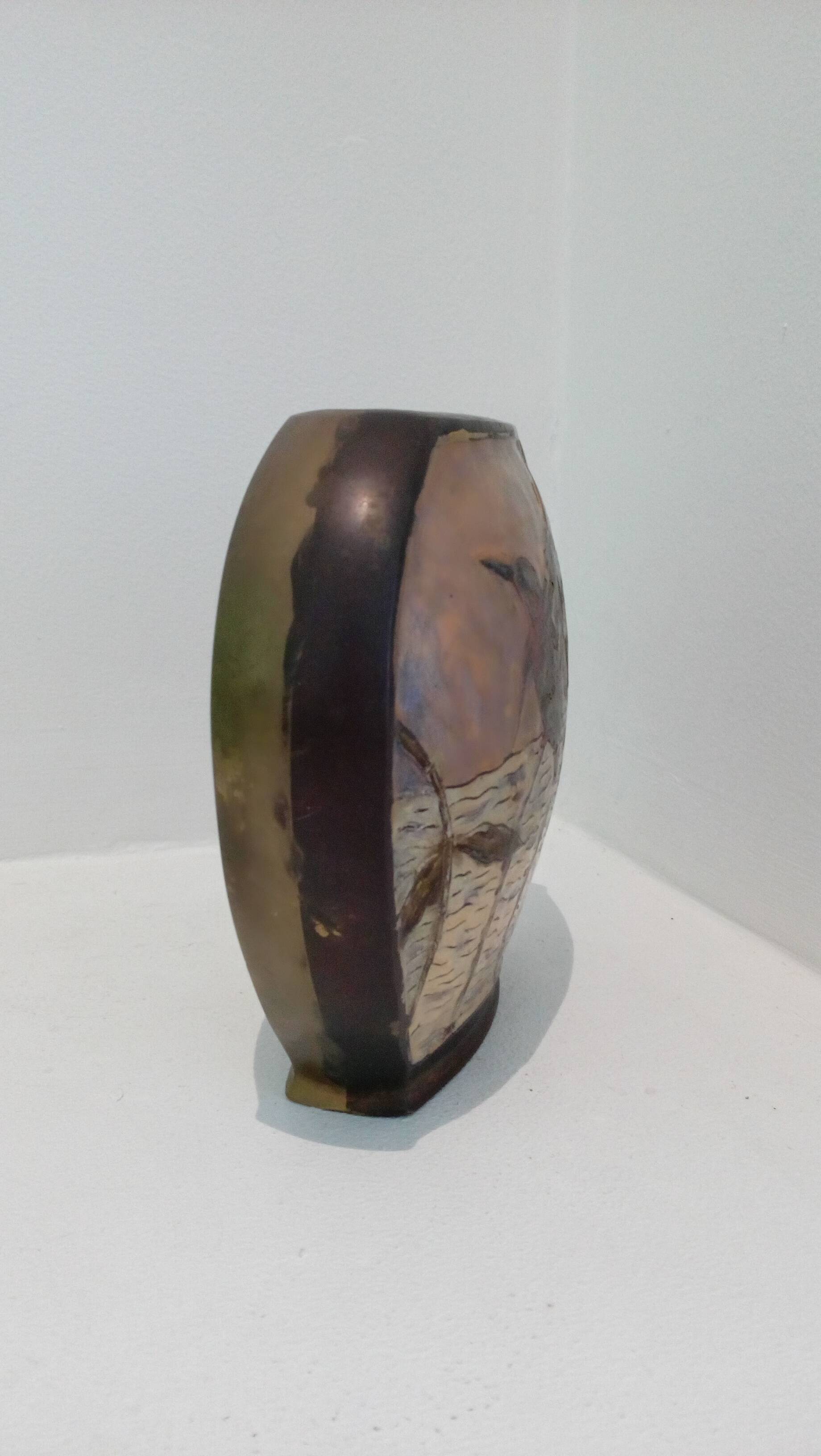 Brass vase with bird décor