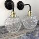 Pair of chiseled glass wall sconces
