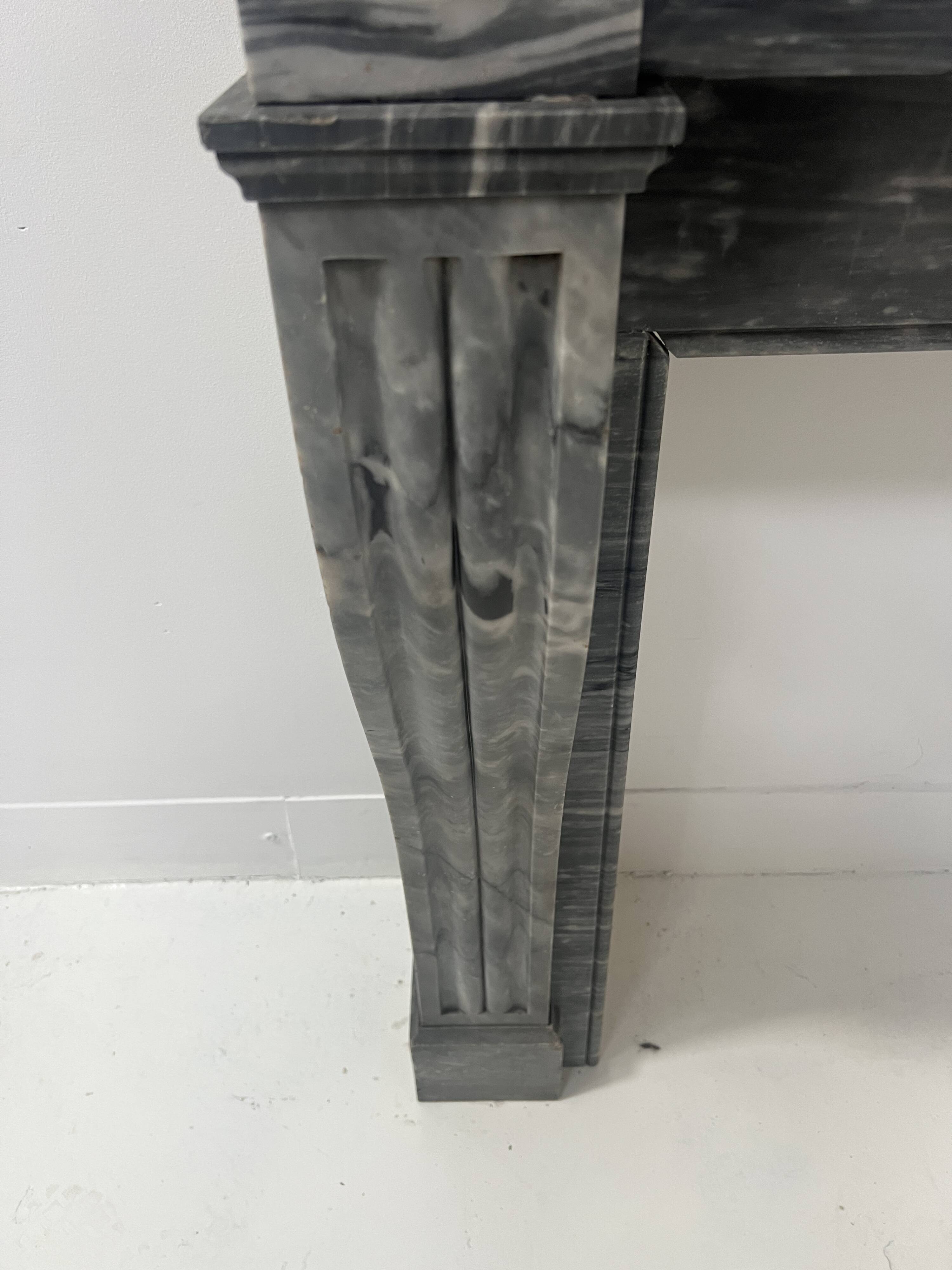 Napoleon III fireplace in blue Turquin marble from the 19th century.