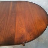 Table ronde extensible baumann en merisier