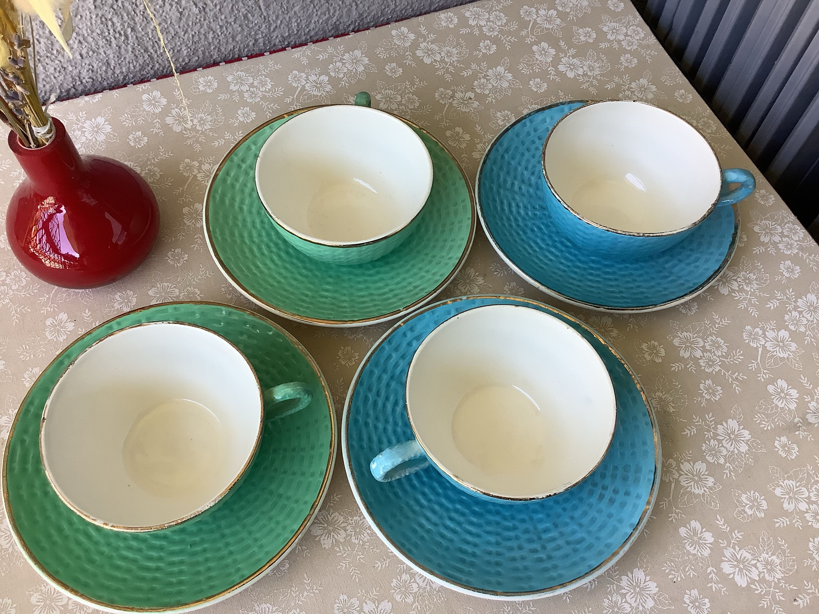 Multicolored Digoin cups looking basket weaving