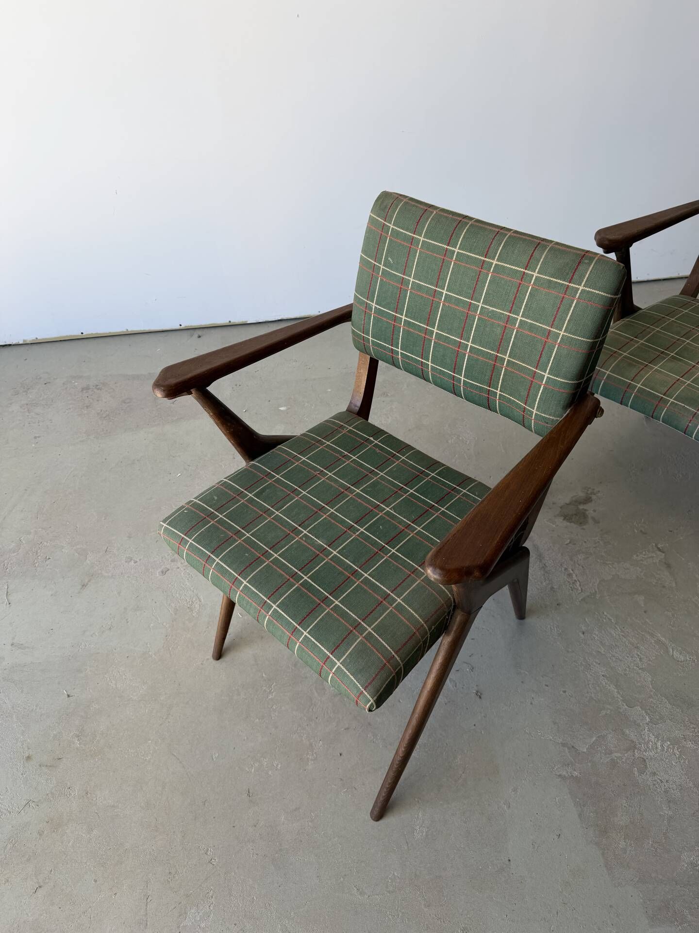Pair of armchairs with a Scandinavian design in vintage teak from the 1960s.
