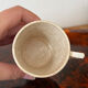 Set of two antique opaque porcelain cups from Gien.