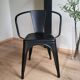 Black Tolix chair with armrests