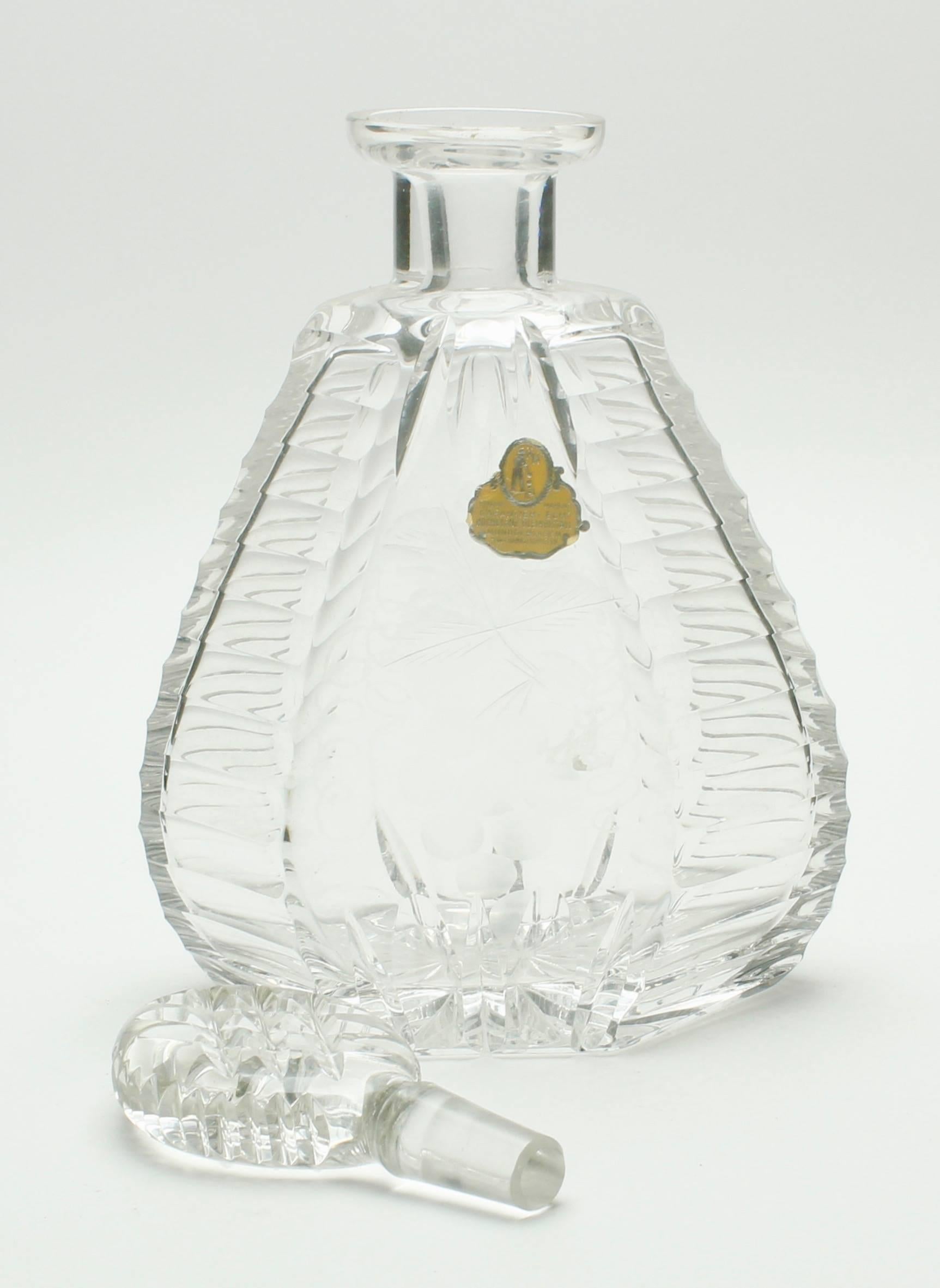 Matching pair of bohemian crystal decanters with art deco motifs