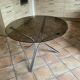 Tripod table Roche Bobois. 1970. Chrome and smoked glass.
