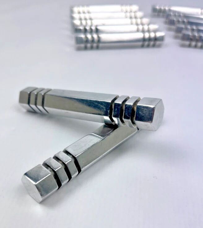 Set of 12 chrome metal knife rests by Louis Prodhon, Art Deco.