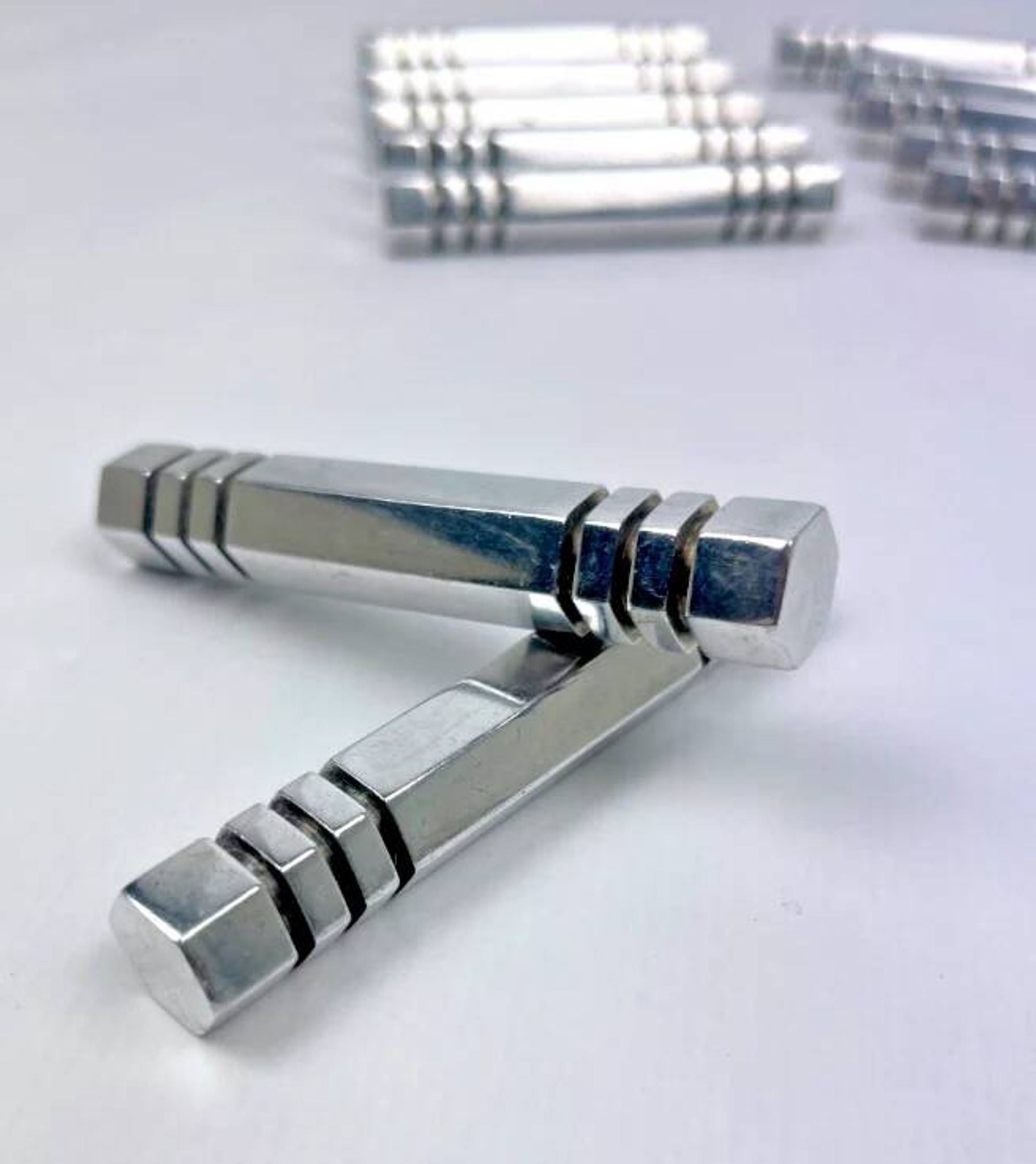 Set of 12 chrome metal knife rests by Louis Prodhon, Art Deco.