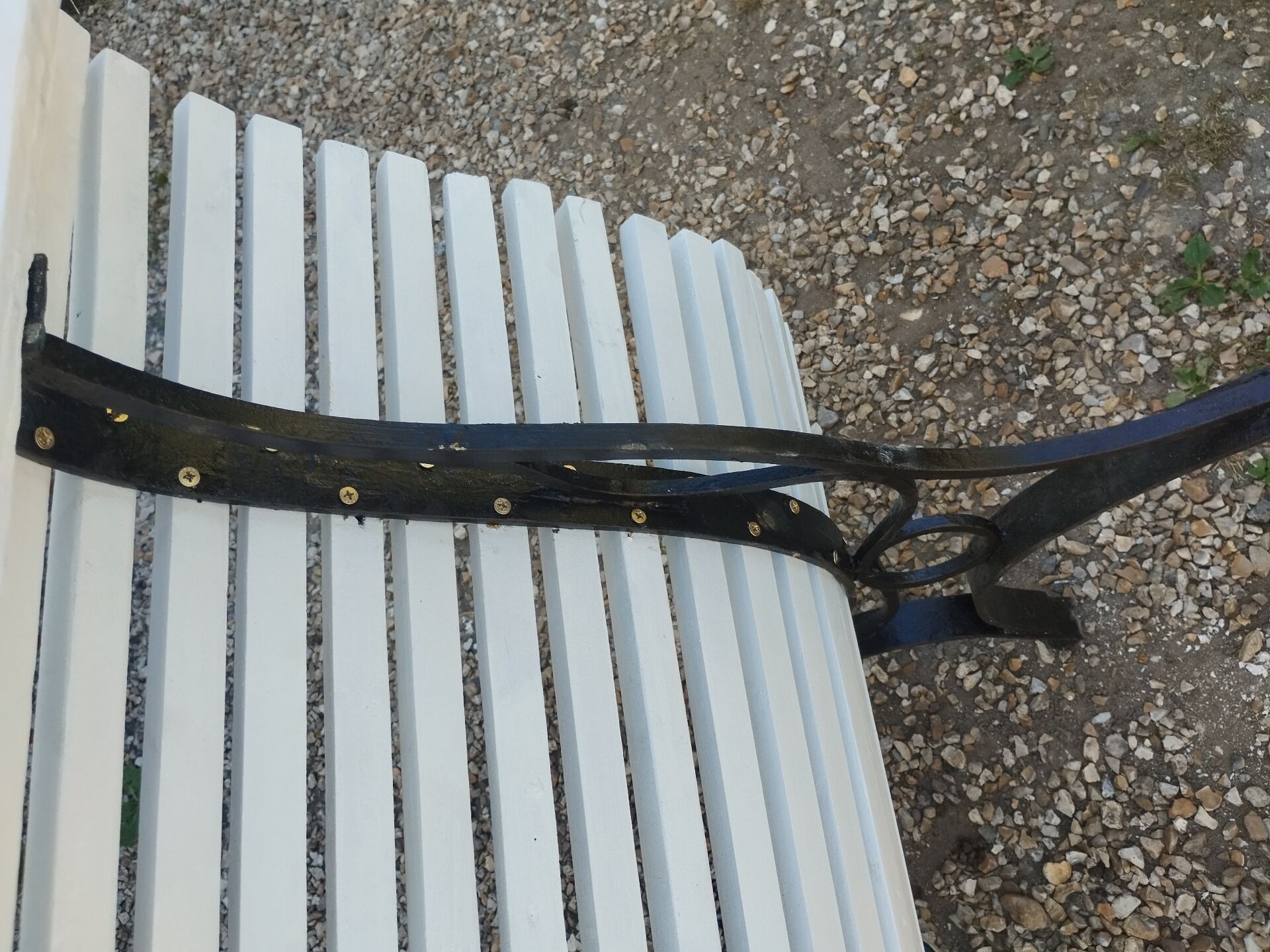 Antique garden bench with cast iron legs