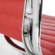 "EA 108" armchair in red leather, designed by Charles and Ray Eames for Vitra,