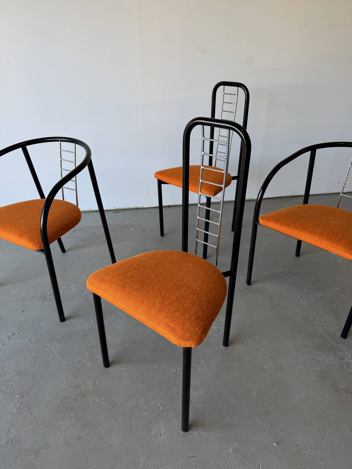 Set of 4 Italian design chairs in vintage black metal and chrome.