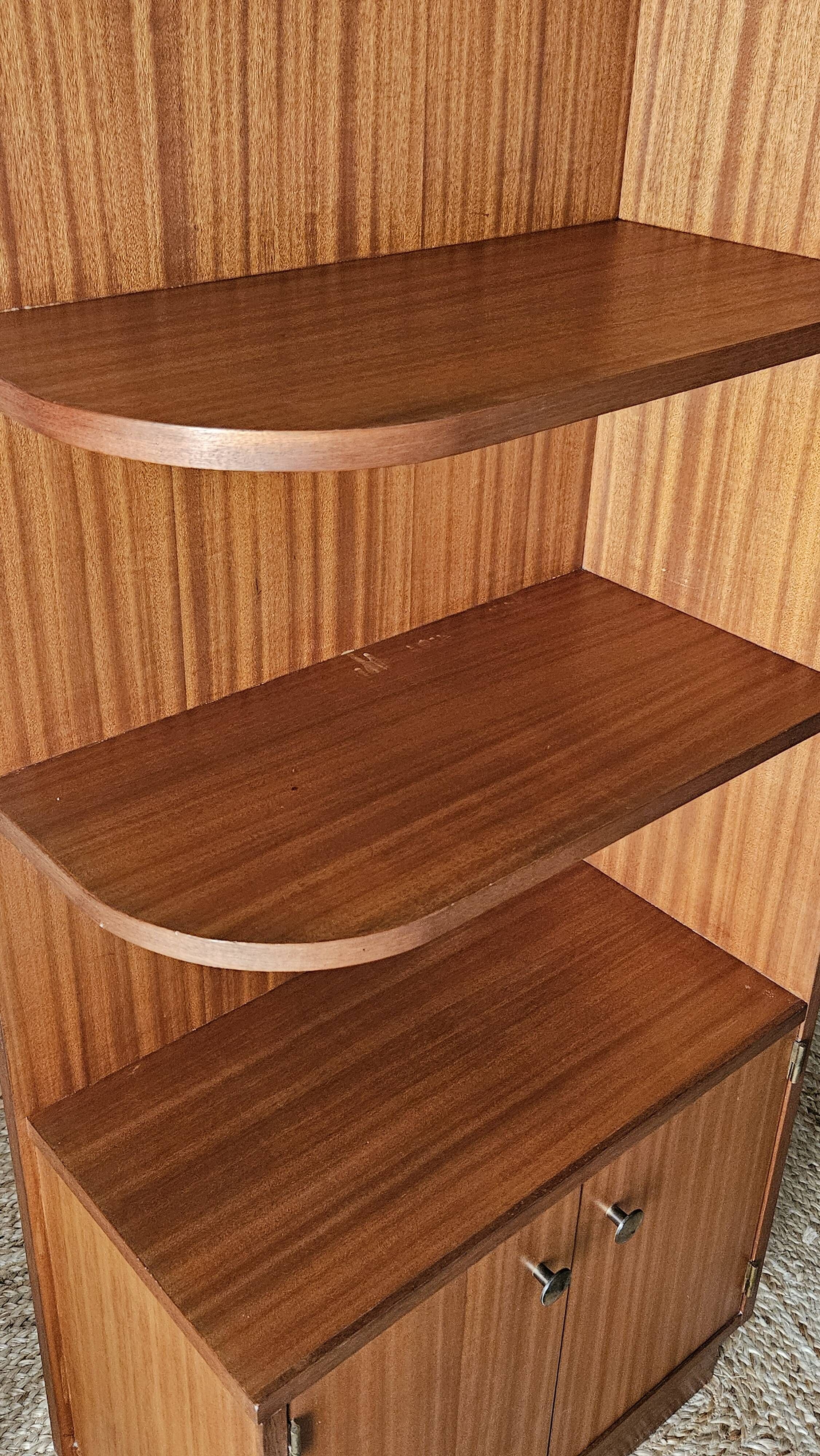 Vintage teak corner bookshelf