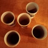 Set of five sandstone mugs