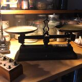 Old cast iron scale with weight
