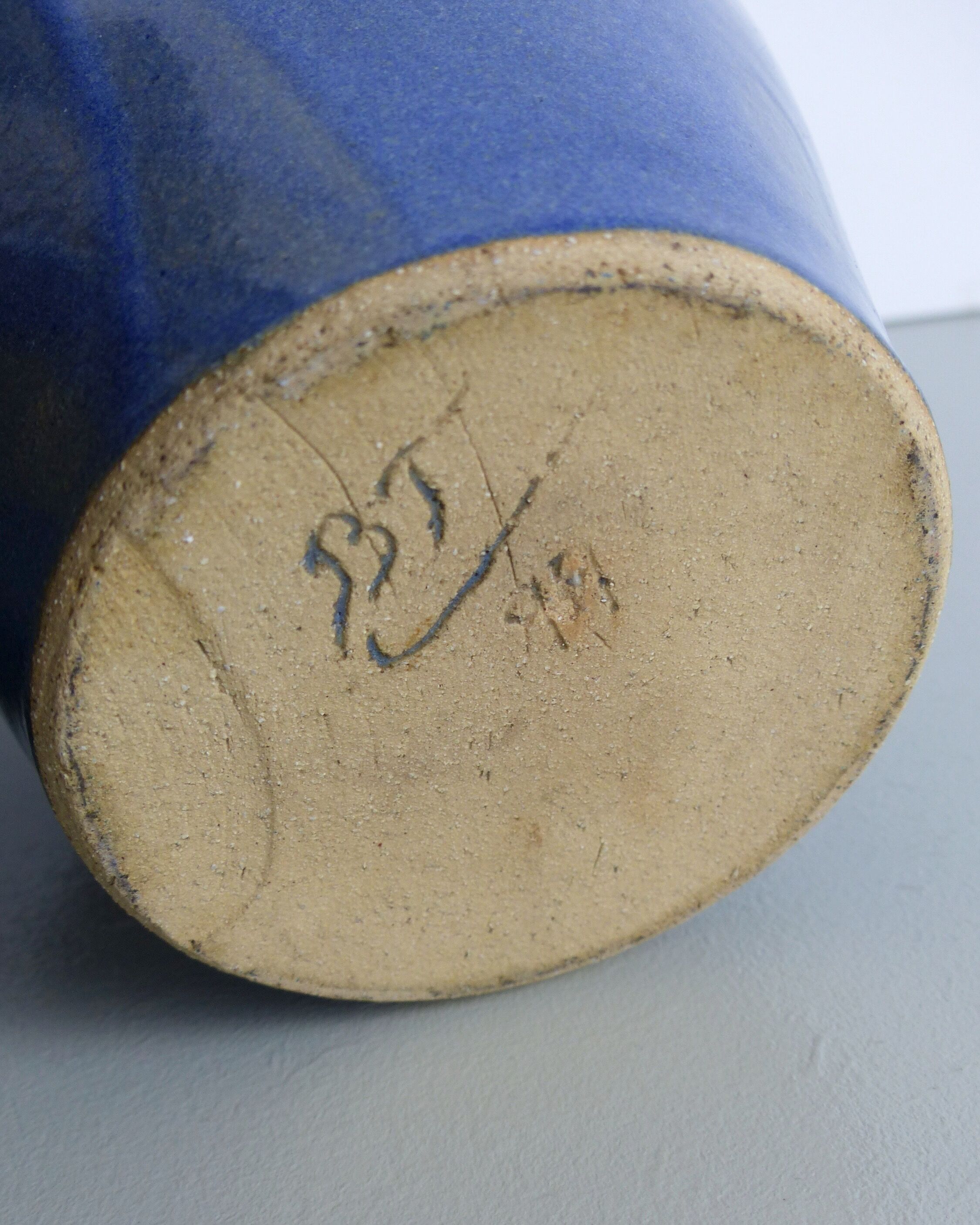 Blue and beige ceramic vase signed