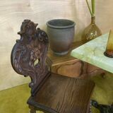Duo of carved wooden chairs