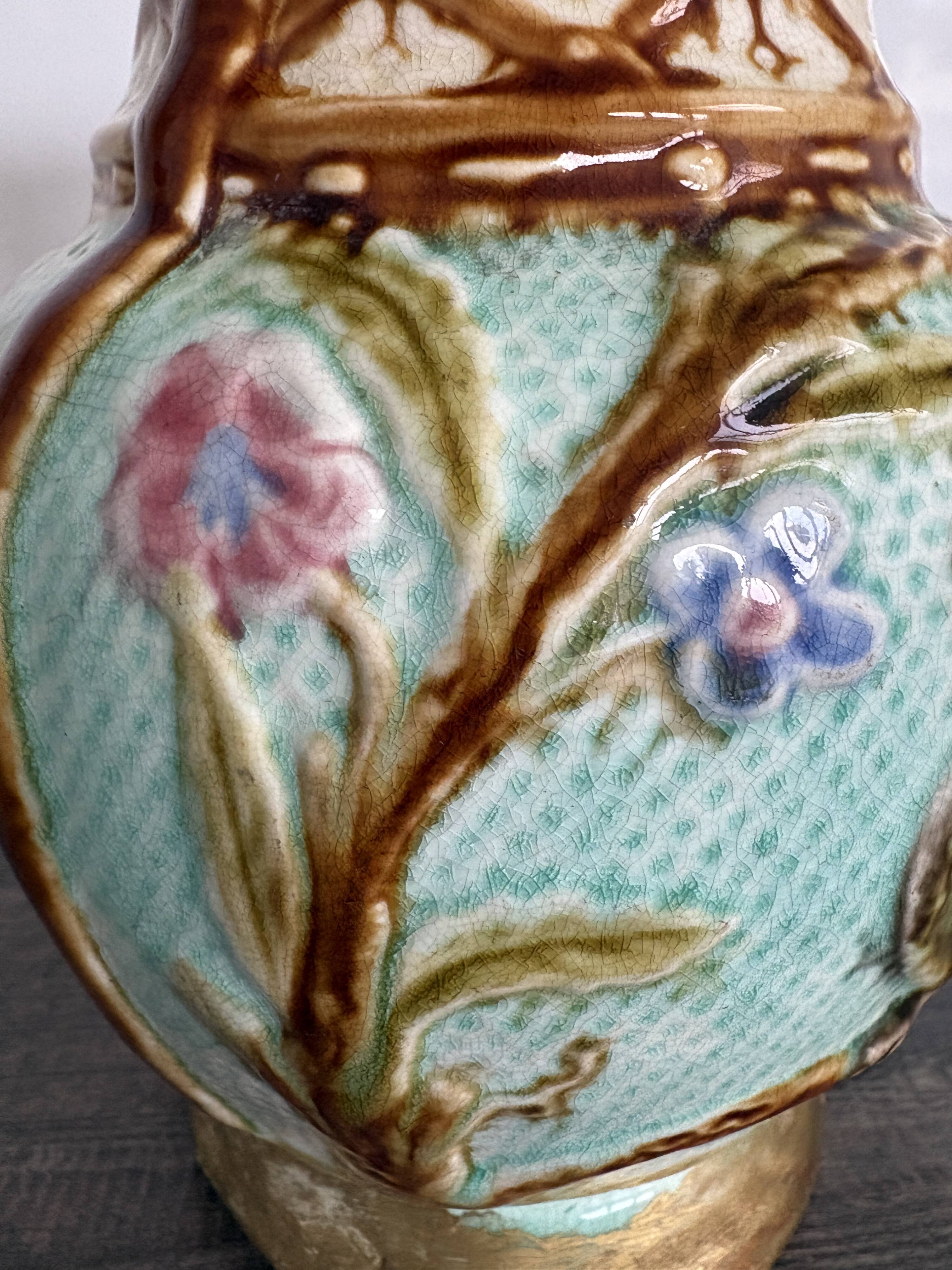 Pichet barbotine 19th century with bird decoration.