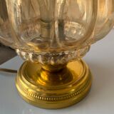 Old vintage table lamp made of amber molded glass
