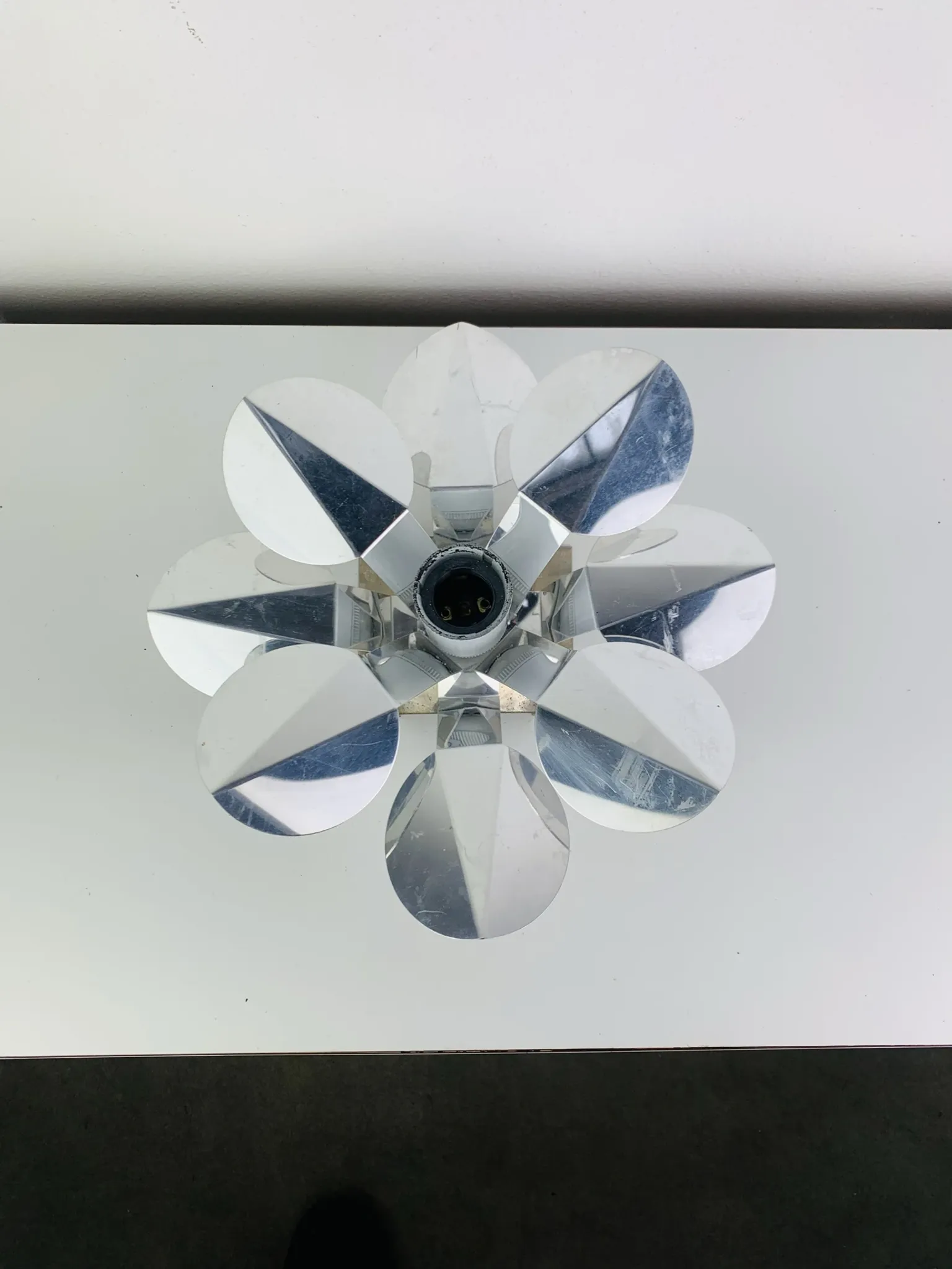 Space Age chrome flower wall light from the 1960s.