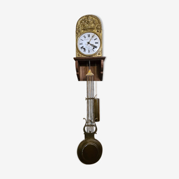 Comtoise clock with antique pendulum