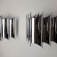 Pair of Raak wall lamps, space-age chrome design, Germany, 1970