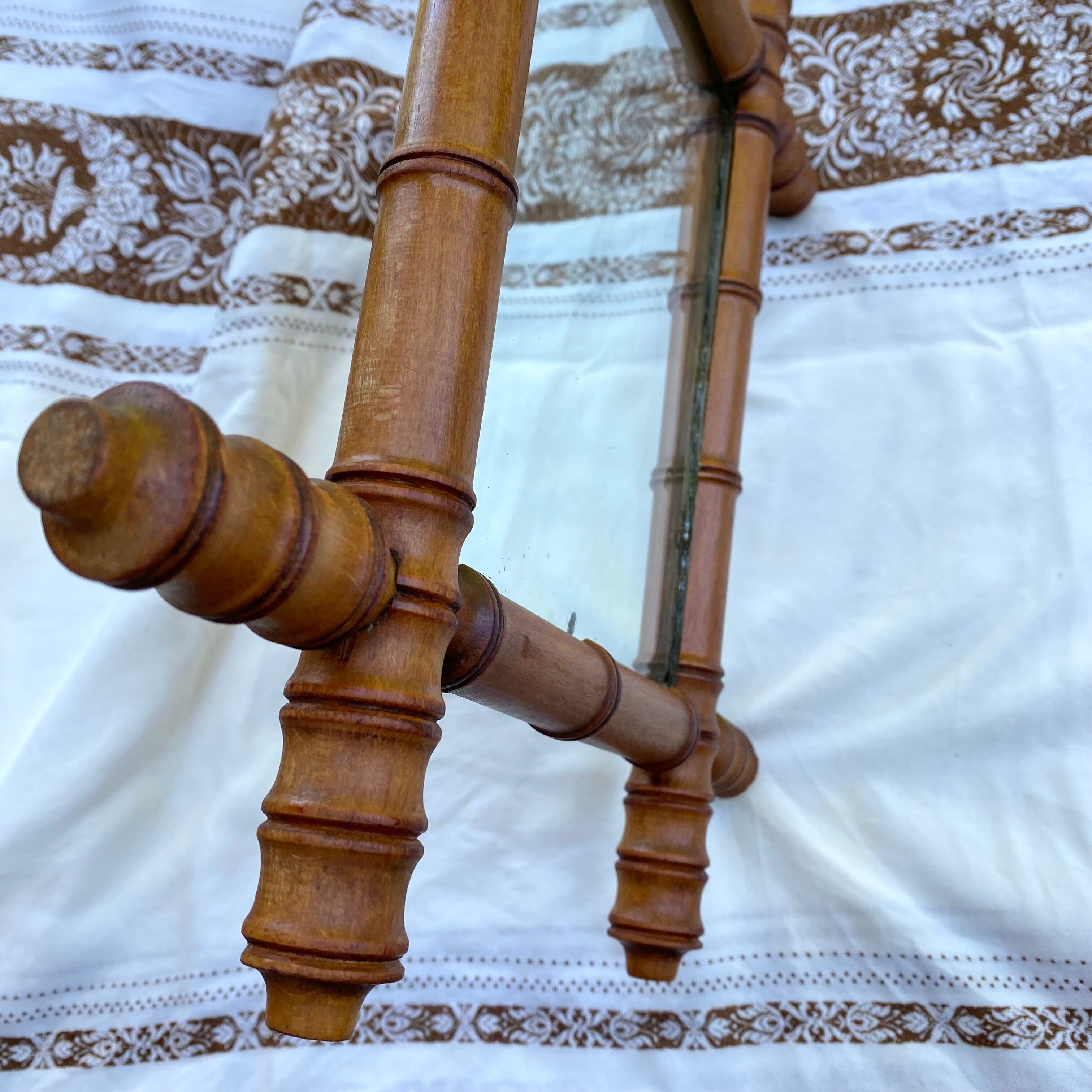 Antique mercury mirror in bamboo-style wood