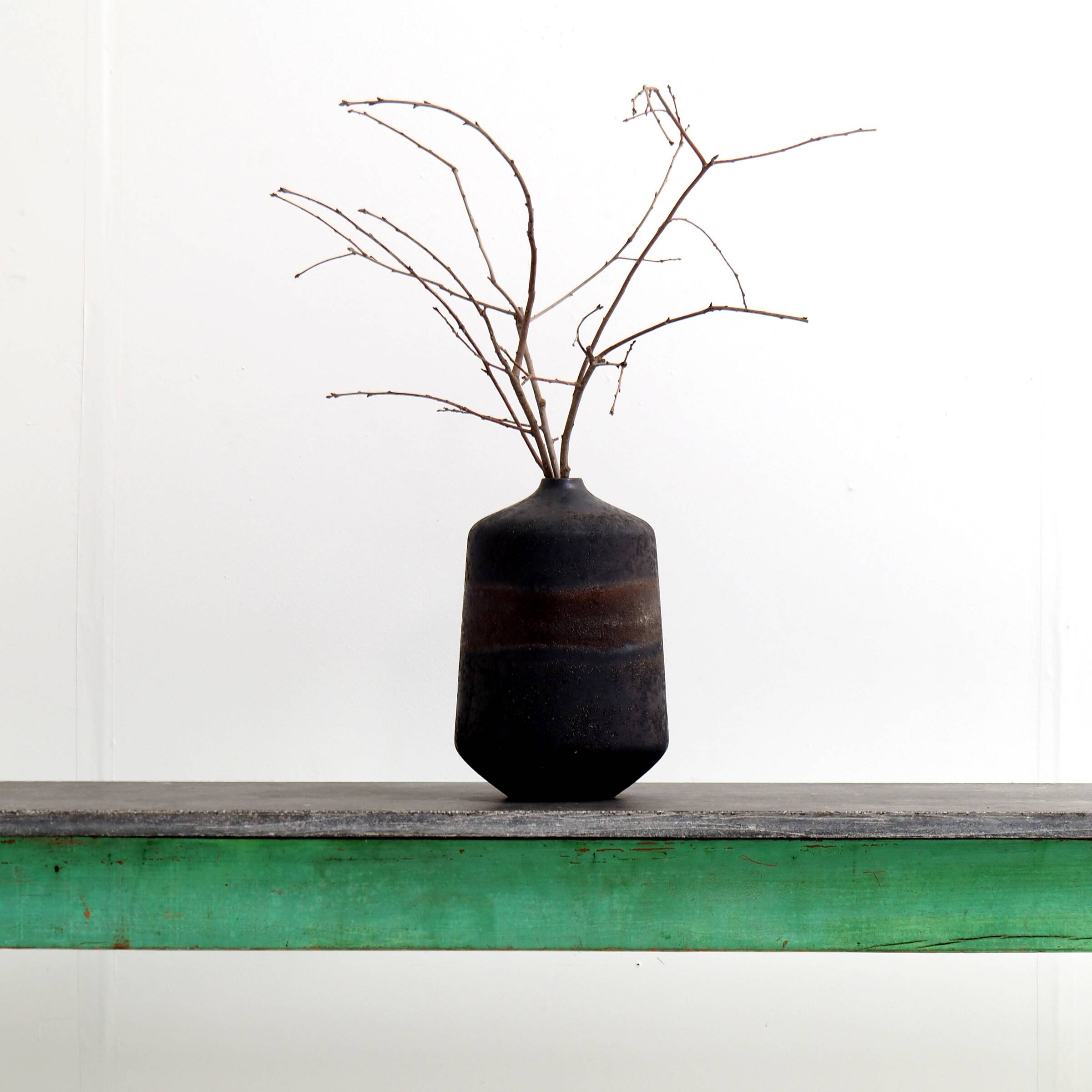 Side table or console with a robust design and high decorative value.