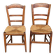2 solid oak and straw wood chairs