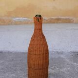 Bouteille en rotin vintage
