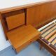 Double bed in vintage Scandinavian style from the 1960s with bedside tables in teak.