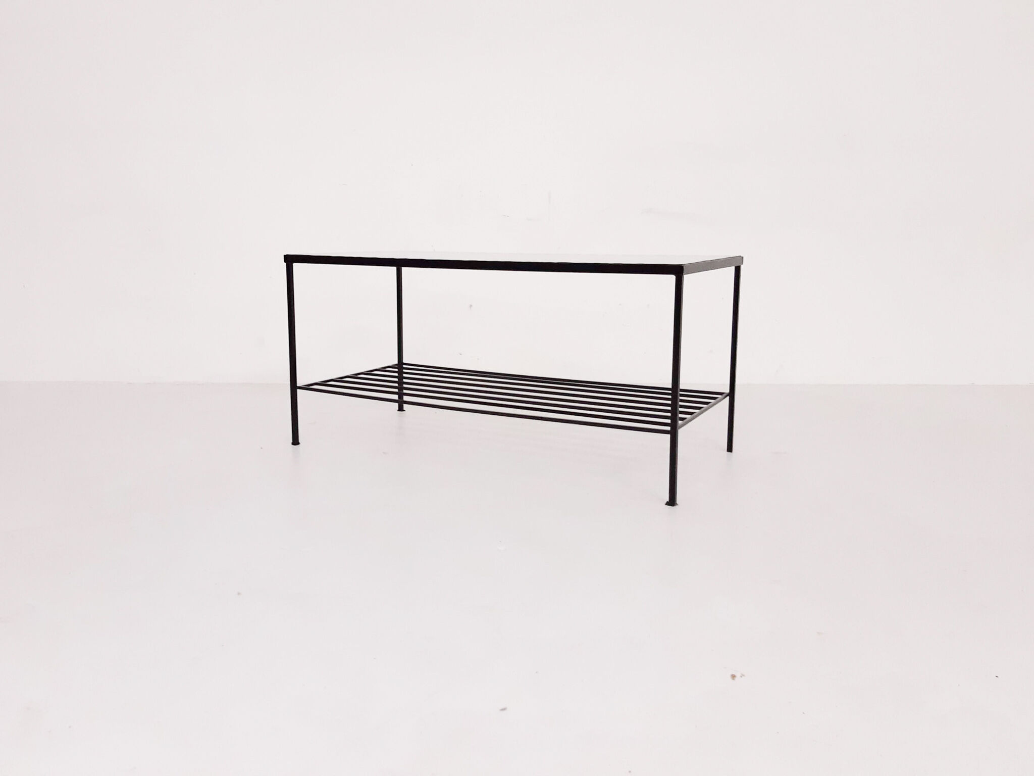 Mid-century modern minimalistic metal and glass coffee table