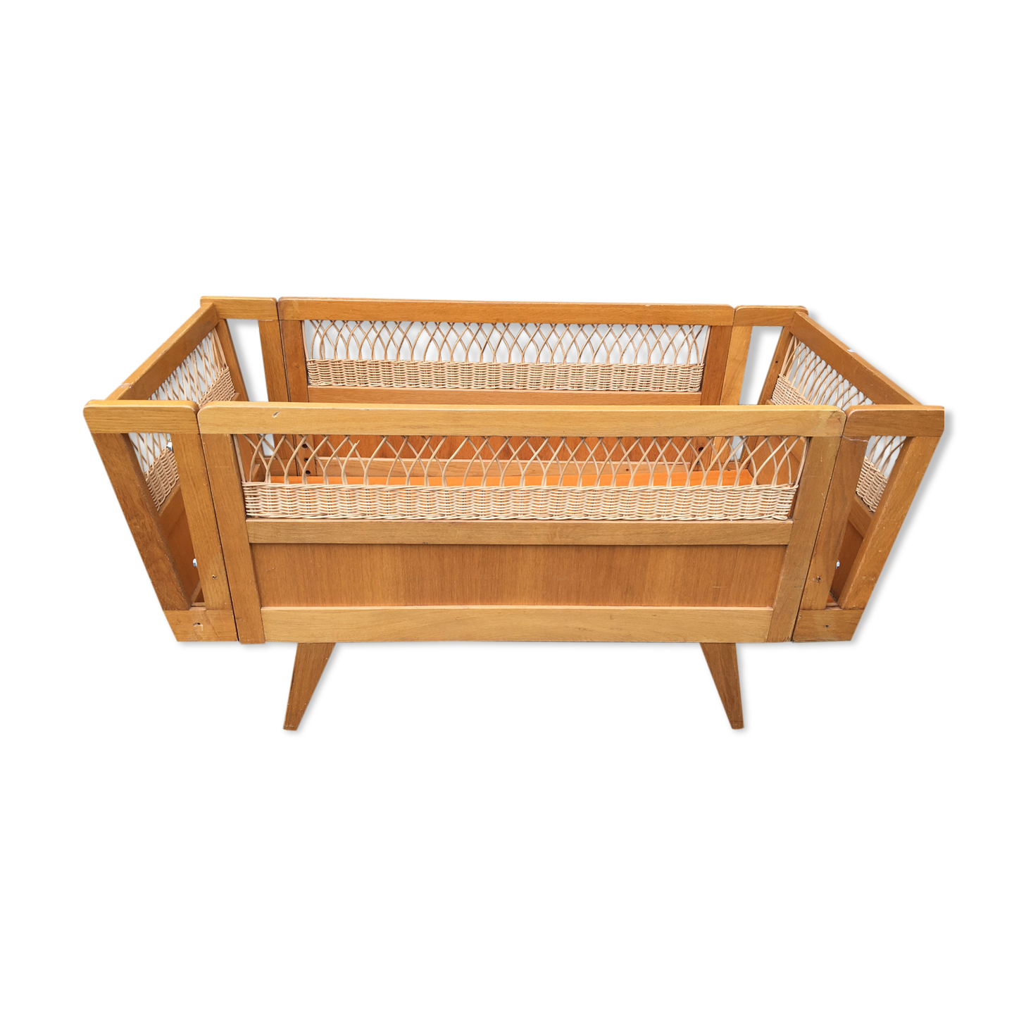 Wooden and rattan baby bed