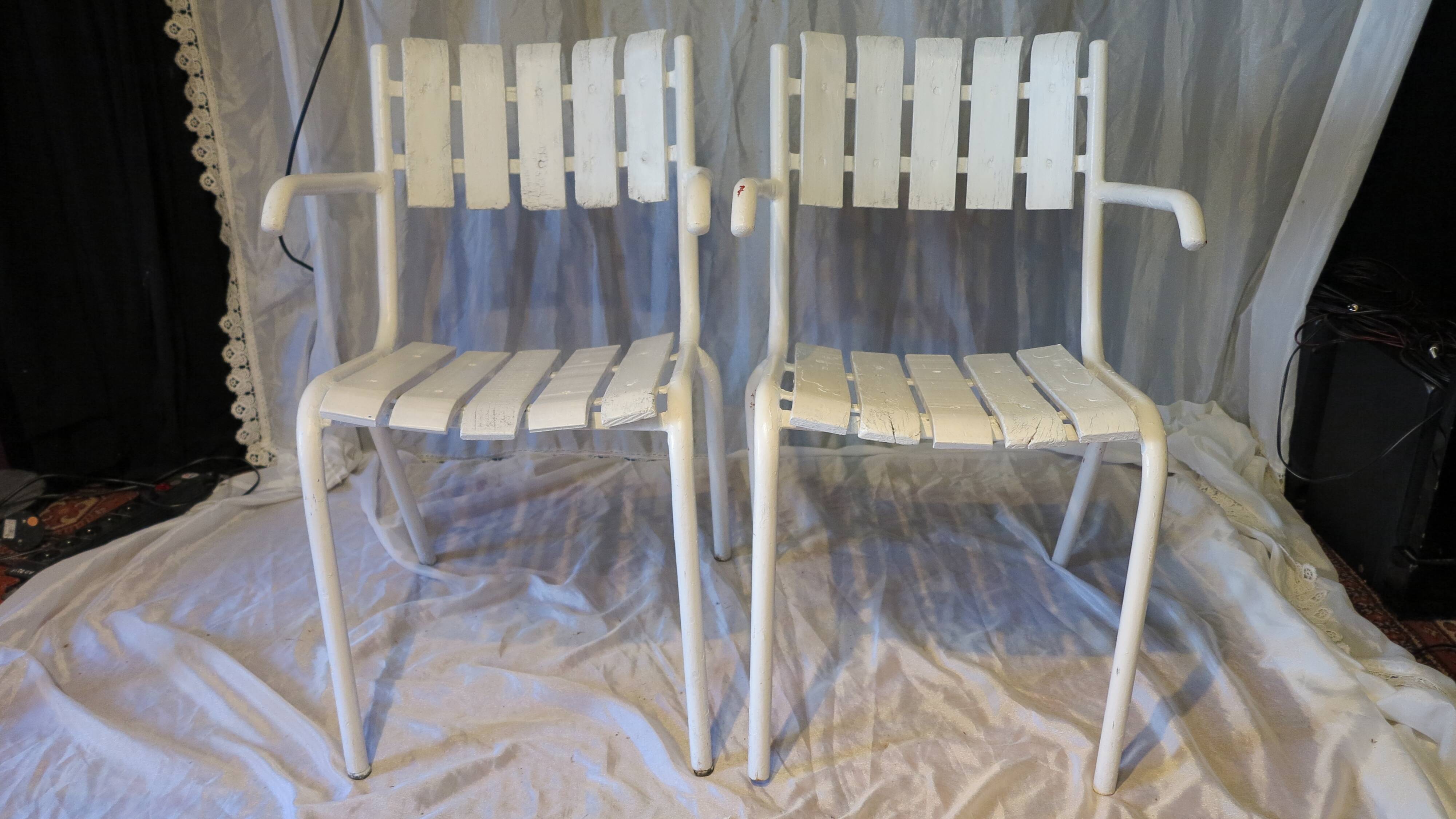 Pair of white garden armchairs