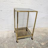 Vintage rolling table in brass and smoked glass