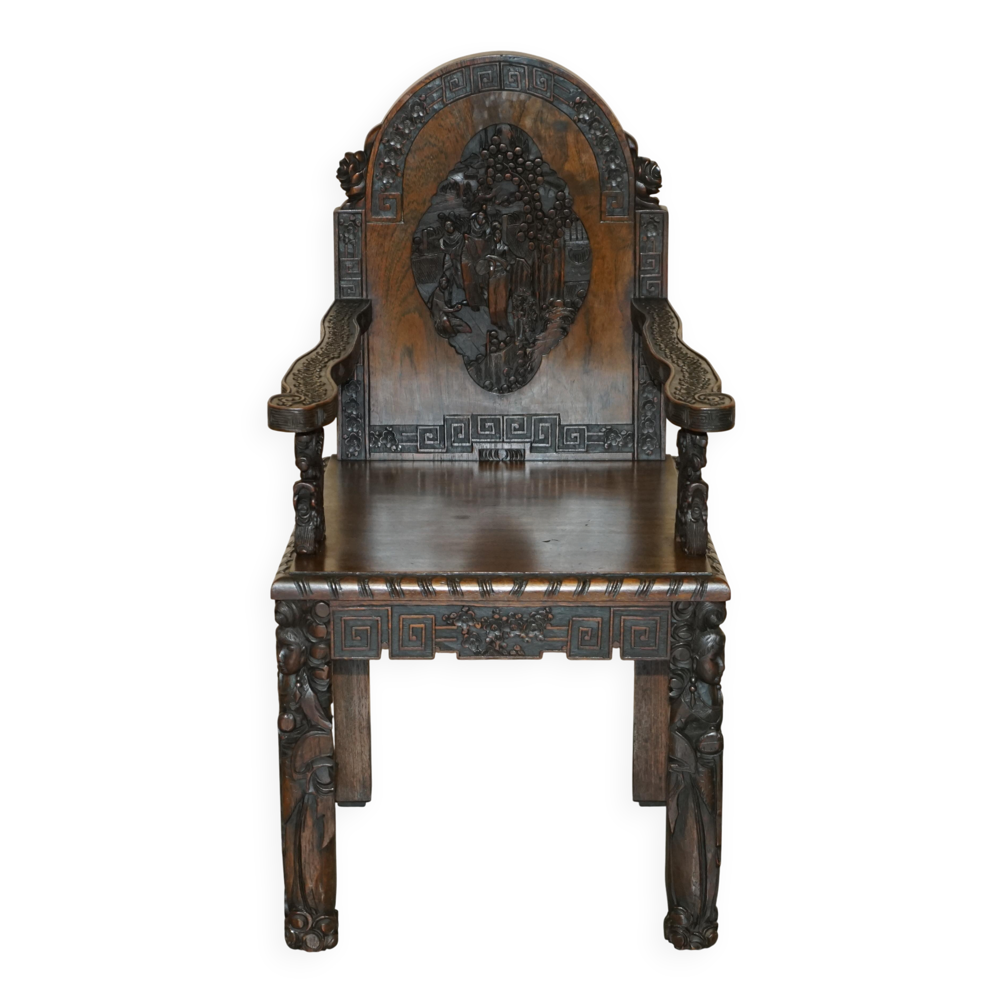 Chinese hand-carved desk from around 1940 with matching chair.