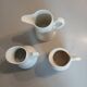 3 small antique porcelain pitchers/milk pots