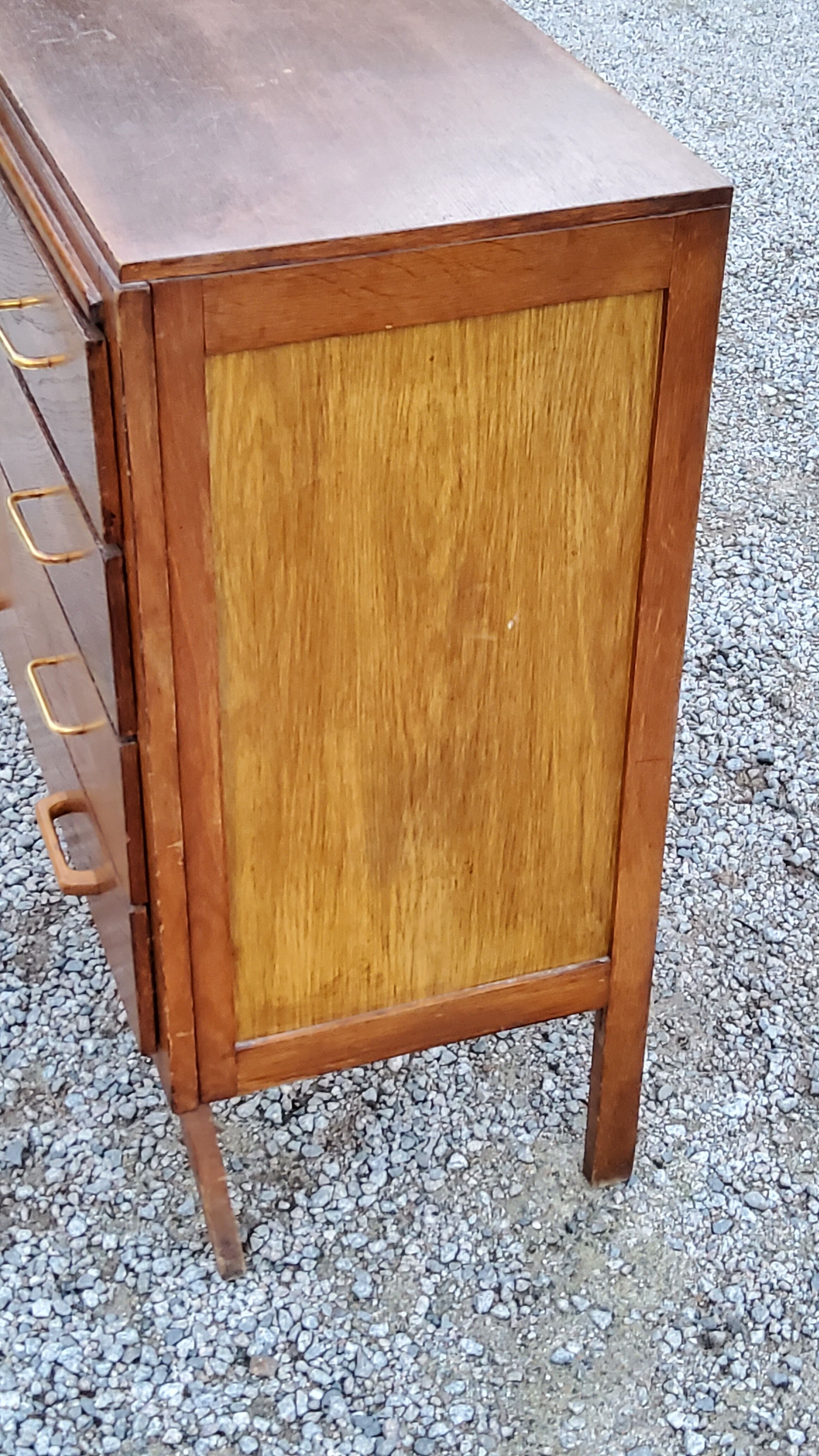 Chest of drawers of the 50s in golden oak compass feet 4 drawers