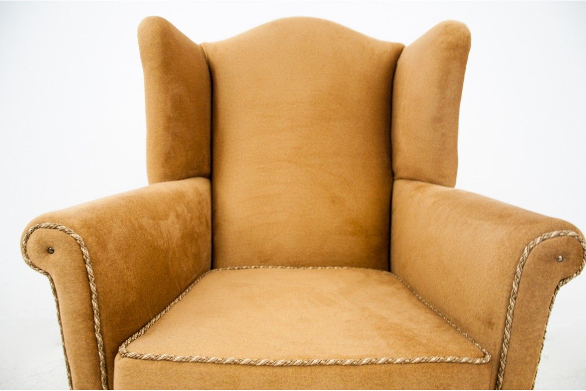 Yellow wingback armchair, Northern Europe, circa 1940s