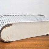 White perforated sheet metal planter by Mathieu Mategot