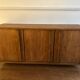 Sideboard made from recycled teak and metal legs