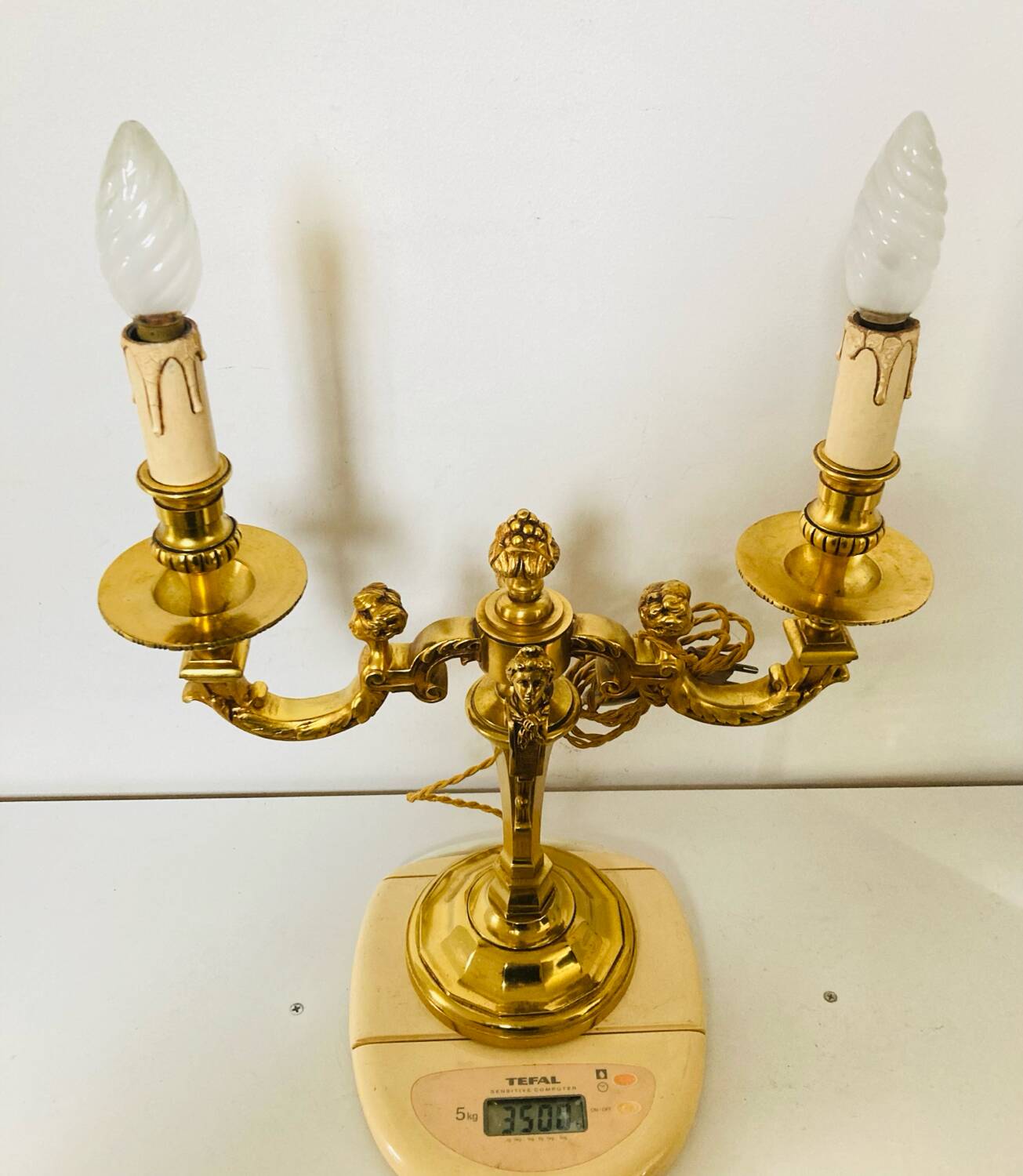 Chandelier en bronze à décors de putti et cariatides, début XXe