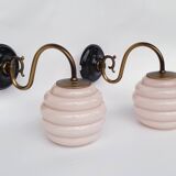 Swan neck wall lights in brass and glass