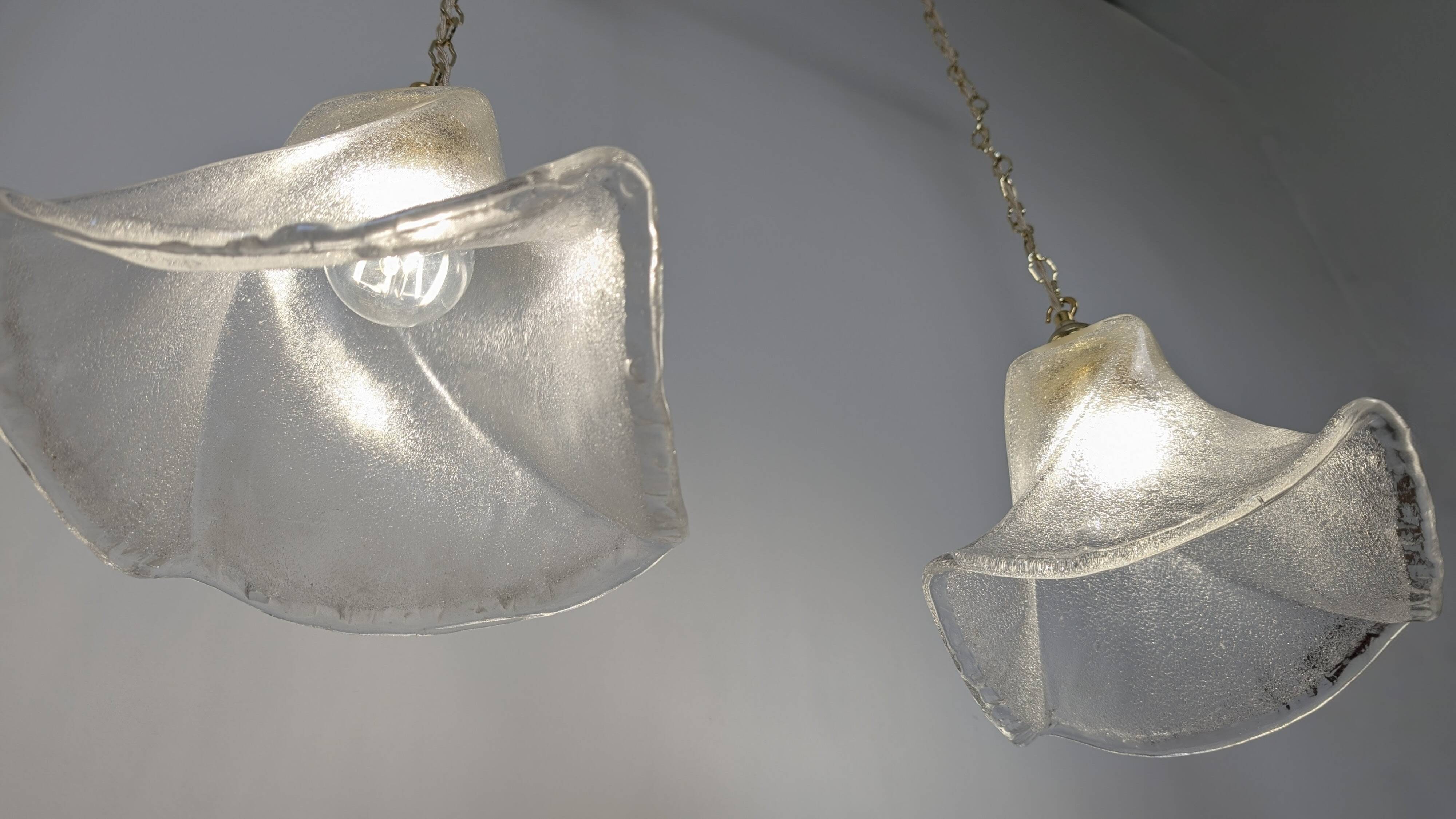 Pair of granite glass and brass pendant lights – poetic elegance