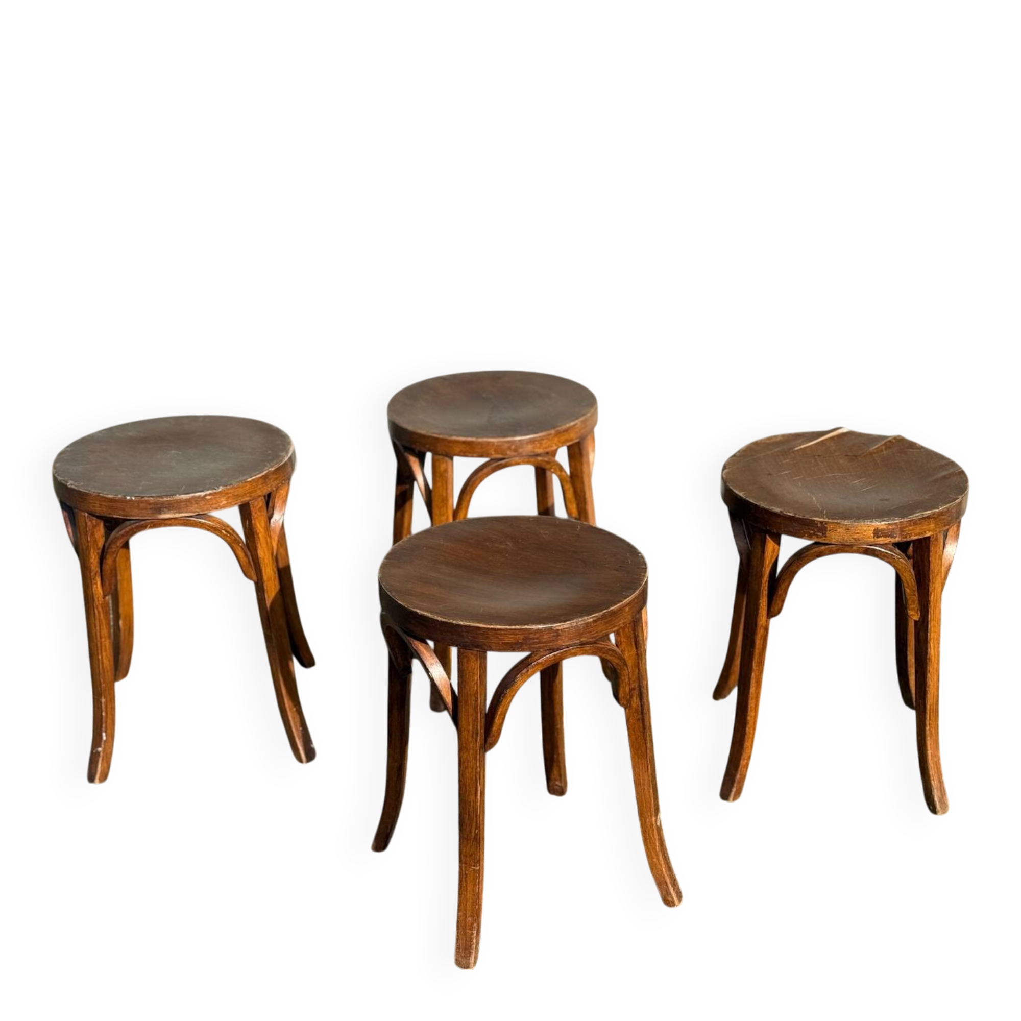 Set of four curved wooden stools stamped Baumann model 92.