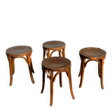 Set of four curved wooden stools stamped Baumann model 92.